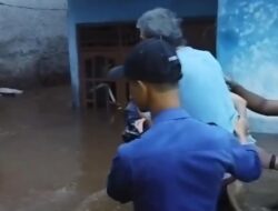 “Banjir Depok: Damkar Gendong Warga dan Kucing Oren, Menyelamatkan yang Tertinggal”