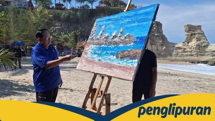 SBY Membuat Seni dengan Finger Painting, Abadikan Keindahan Pantai Pacitan!