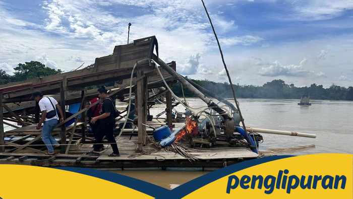 **Drone Polda Riau Ungkap Misteri Puluhan Rakit PETI di Sungai Kuantan**