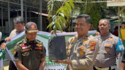 “Kolaborasi Polisi dan Ormas di Kuansing Tanam Pohon untuk Masa Depan”