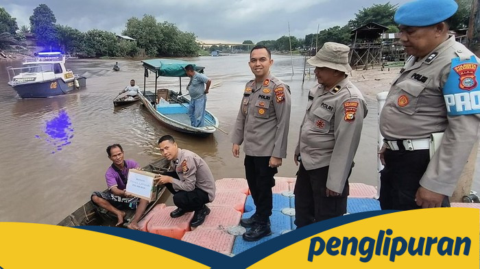 **Dari Tepian Sungai Siak Pekanbaru, Polisi Bantu Nelayan dan Bersihkan Sampah di Jalur Riau**