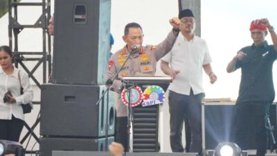 **Kapolri Tegaskan Dukungan Penuh Kebijakan Pemerintah dalam Apel Akbar Buruh Nasional**