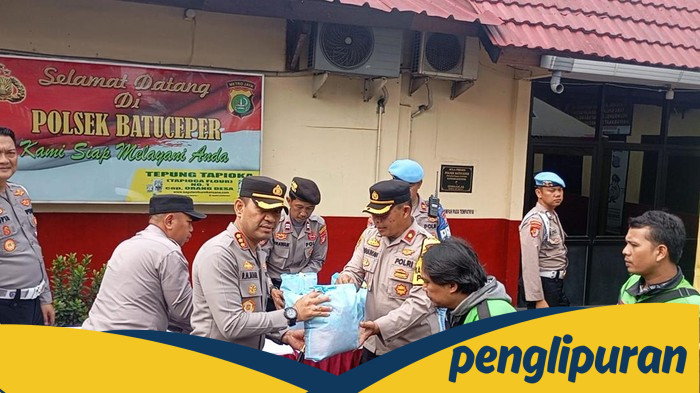 **Polisi Tangerang Berikan Sembako kepada Ojol dan Masyarakat Slum, Gelar Baksos di Tengah Masyarakat**